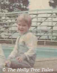 Child smiling shyly - (c) Holly Maxwell Boydell    www.TheHollyTreeTales.com