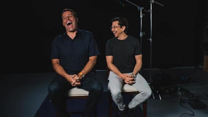 Tony Robbins and Dean Graziosi, having a chuckle.